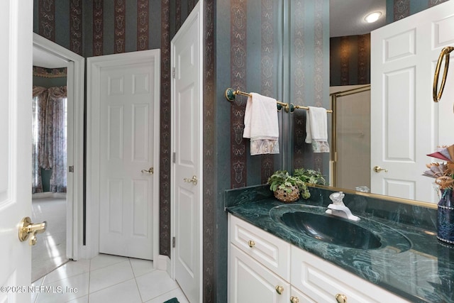 bathroom with vanity and tile patterned floors