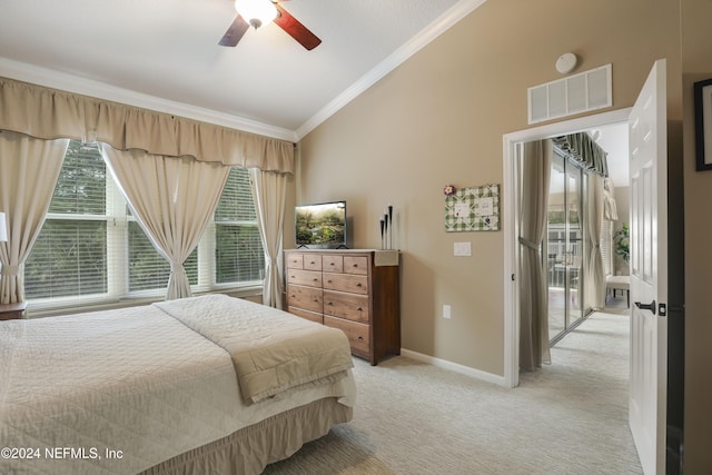 carpeted bedroom featuring ceiling fan, ornamental molding, and access to outside