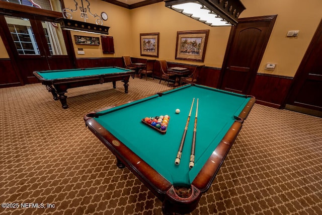 rec room featuring carpet flooring, wooden walls, crown molding, and pool table