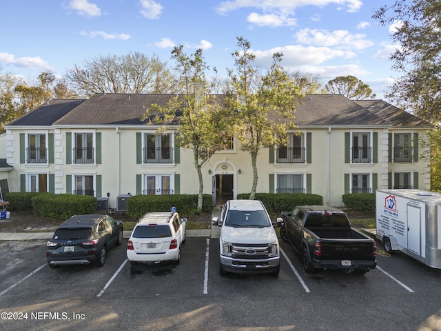 view of building exterior with central AC unit