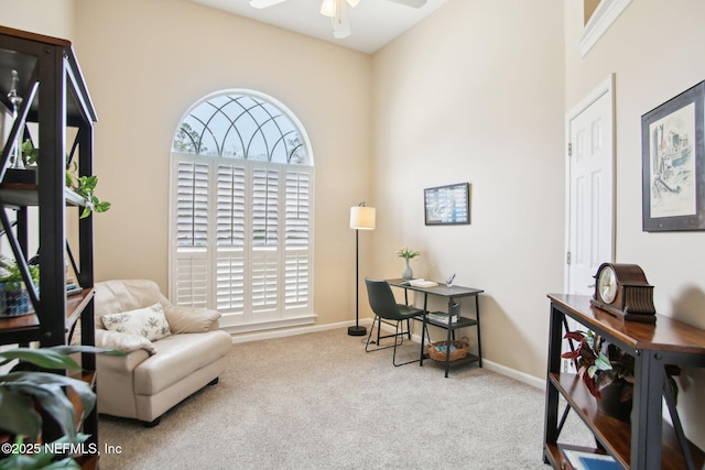 office featuring baseboards, plenty of natural light, carpet, and a ceiling fan