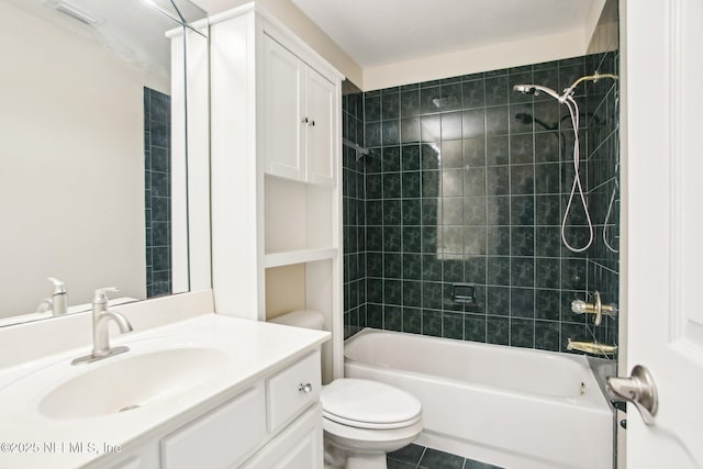 full bath with tile patterned floors, vanity, toilet, and shower / bathing tub combination