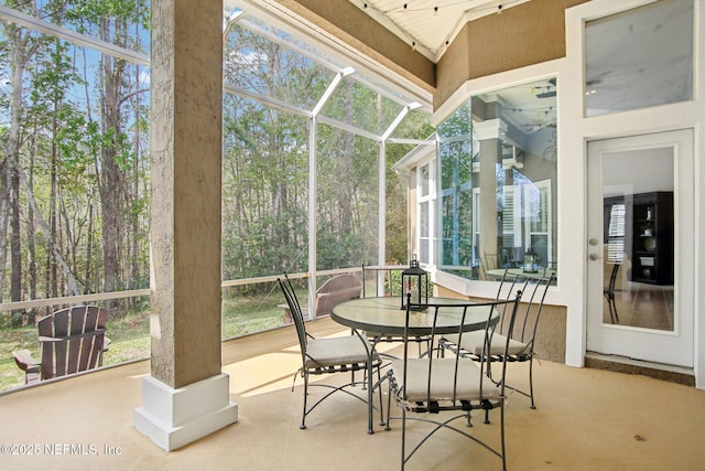 sunroom featuring a healthy amount of sunlight