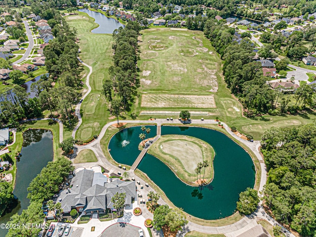 birds eye view of property featuring a residential view, golf course view, and a water view