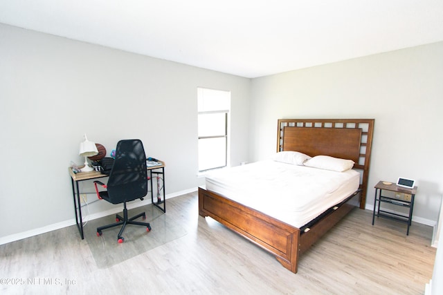 bedroom featuring light hardwood / wood-style floors