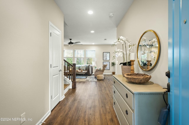 hall with dark wood-type flooring