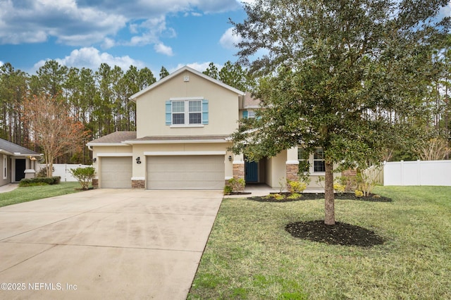 view of front of property featuring stucco siding, driveway, a garage, and stone siding