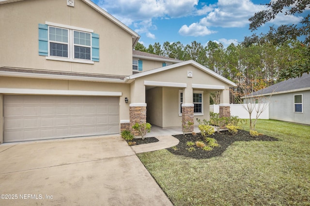 13 Peter Island Dr, Saint Augustine, FL 32092 - view of front of home with stucco siding, stone siding, a garage, concrete driveway, and covered porch