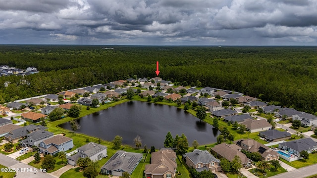 13 Peter Island Dr, Saint Augustine, FL 32092 - aerial overview of property's location featuring a heavily wooded area, nearby suburban area, and a large body of water
