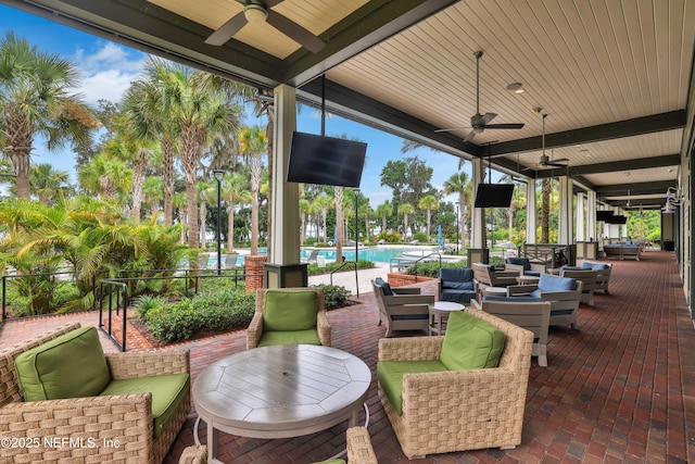 view of patio / terrace with an outdoor hangout area and ceiling fan