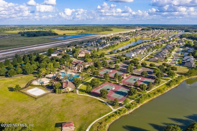 bird's eye view with a water view