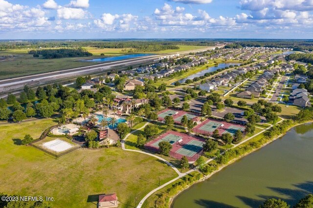 drone / aerial view with a water view