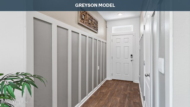 corridor featuring dark hardwood / wood-style flooring