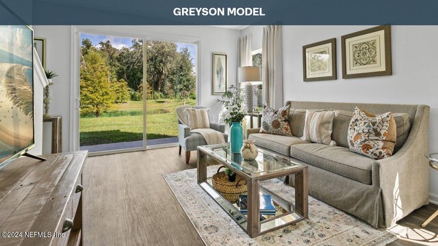 living room with light hardwood / wood-style flooring