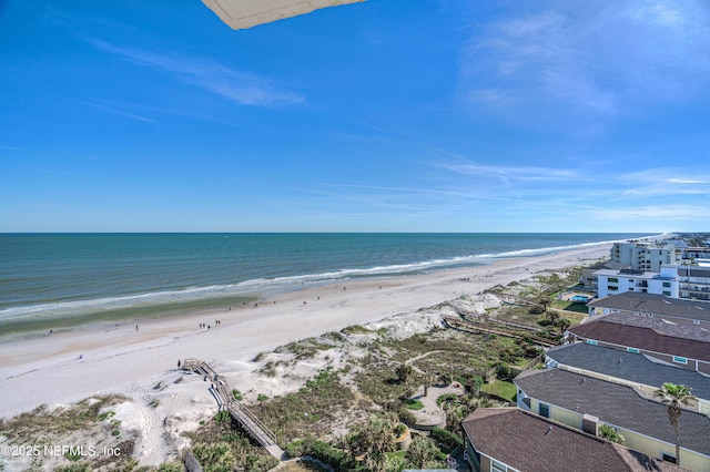 property view of water featuring a beach view