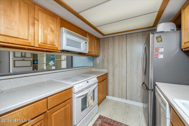 kitchen featuring sink and white appliances