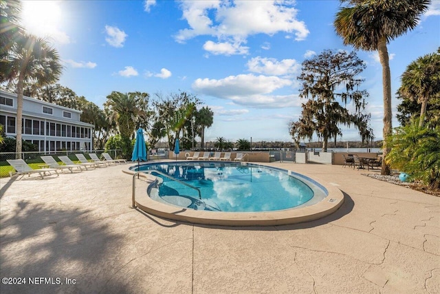 view of pool featuring a patio area