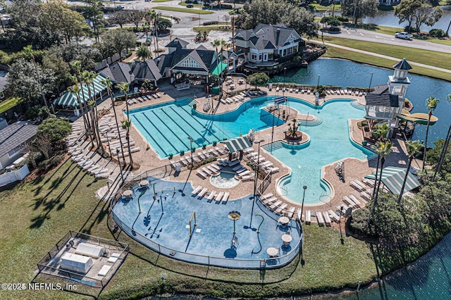 view of pool featuring a water view