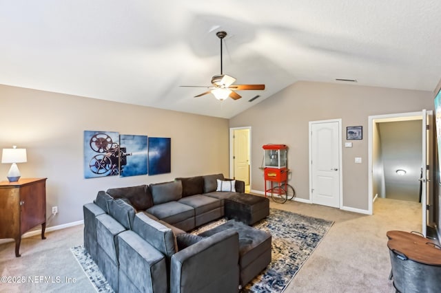 living room featuring ceiling fan, lofted ceiling, and light carpet