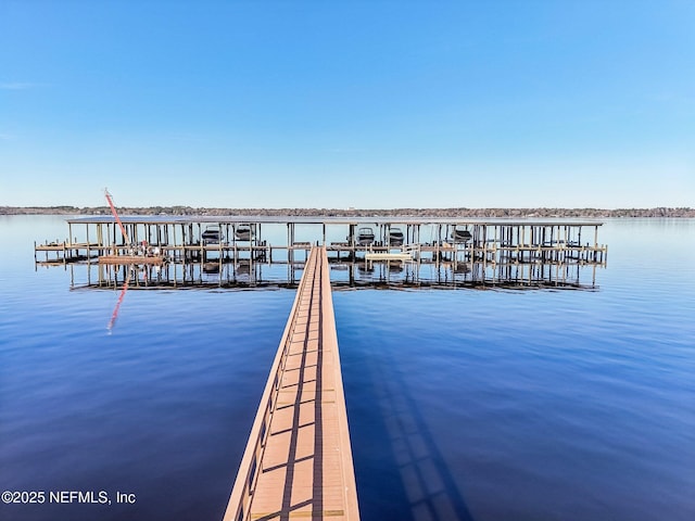 view of dock with a water view