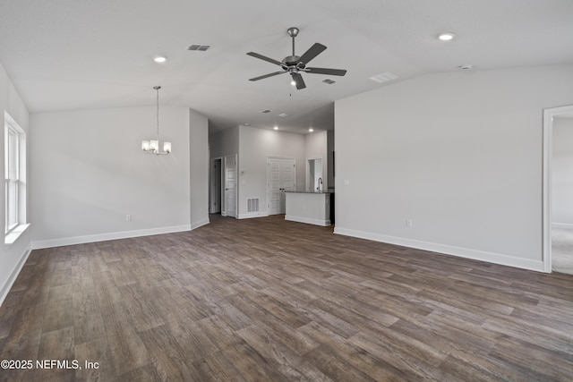 3245 Winding Creek Pl, Green Cove Springs, FL 32043 - unfurnished living room with ceiling fan with notable chandelier, visible vents, and vaulted ceiling