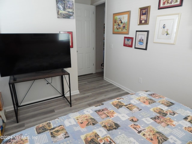 bedroom featuring hardwood / wood-style floors