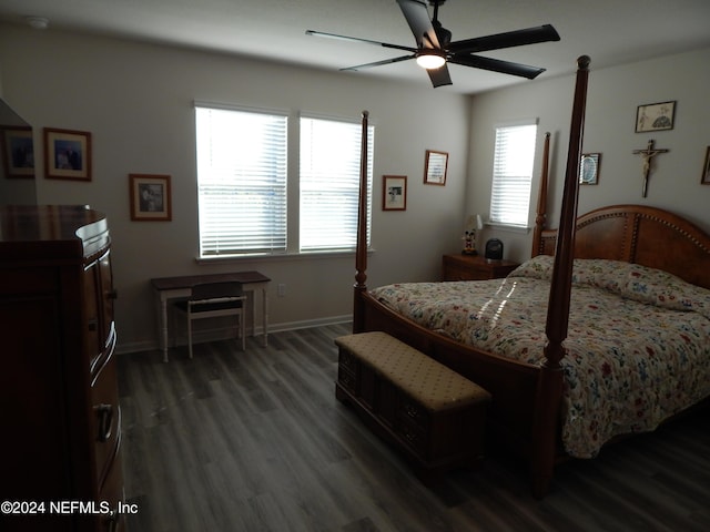 bedroom featuring ceiling fan and dark hardwood / wood-style flooring