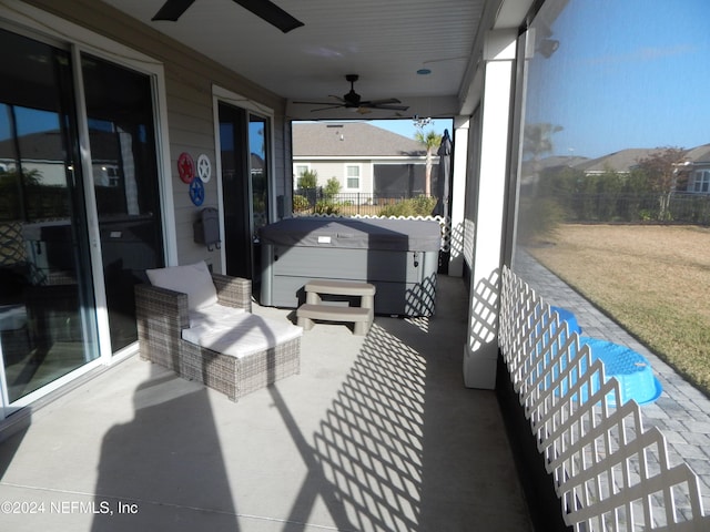 85431 Apple Canyon Ct, Fernandina Beach, FL 32034 - view of patio / terrace with a hot tub and a ceiling fan
