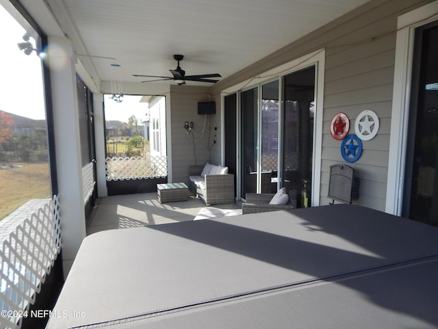 view of patio / terrace featuring ceiling fan