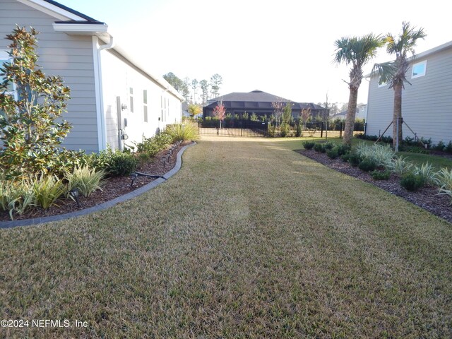 85431 Apple Canyon Ct, Fernandina Beach, FL 32034 - view of green lawn