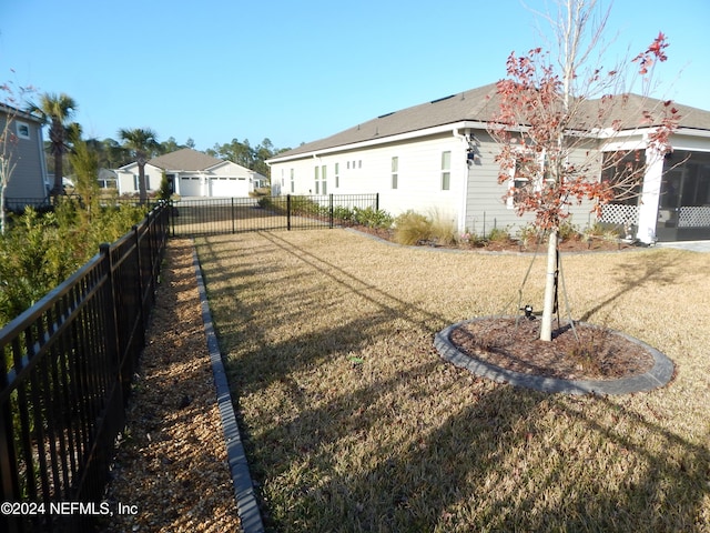 view of yard with a garage