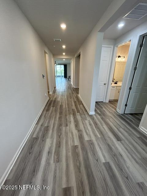 85431 Apple Canyon Ct, Fernandina Beach, FL 32034 - hall featuring wood finished floors and recessed lighting