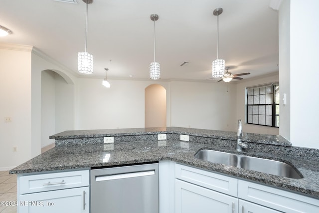 kitchen with ceiling fan, sink, stainless steel dishwasher, pendant lighting, and white cabinets