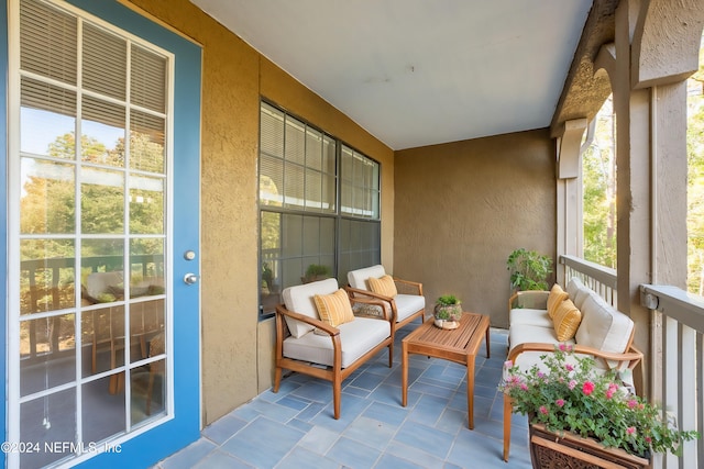 balcony featuring a porch