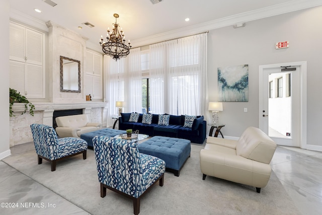 living room featuring ornamental molding and a notable chandelier