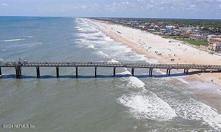 view of water feature with a beach view