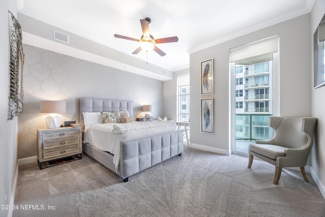 1431 Riverplace Blvd Unit 2105, Jacksonville, FL 32207 - carpeted bedroom featuring a ceiling fan, baseboards, visible vents, and ornamental molding