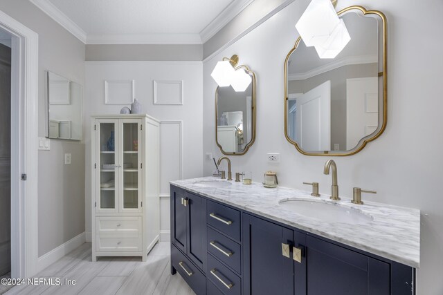 1431 Riverplace Blvd Unit 2105, Jacksonville, FL 32207 - bathroom with a sink, double vanity, a skylight, and crown molding