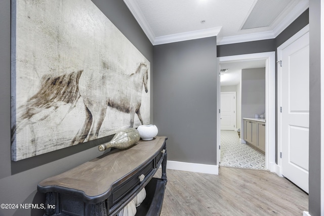 1431 Riverplace Blvd Unit 2105, Jacksonville, FL 32207 - interior space featuring visible vents, light wood-type flooring, crown molding, and baseboards