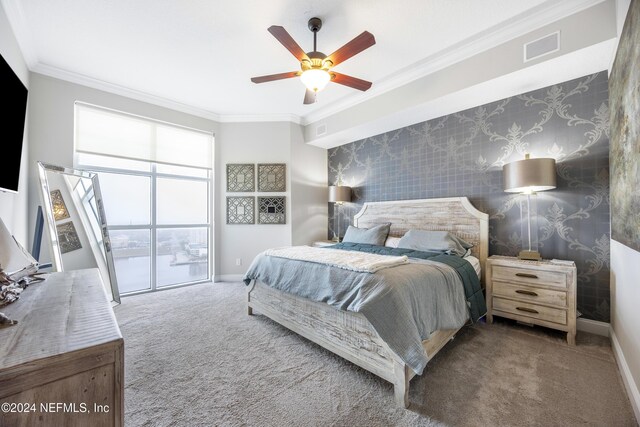 1431 Riverplace Blvd Unit 2105, Jacksonville, FL 32207 - bedroom featuring baseboards, carpet floors, ornamental molding, and wallpapered walls