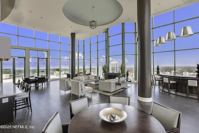 1431 Riverplace Blvd Unit 2105, Jacksonville, FL 32207 - dining room with expansive windows, wood finished floors, and decorative columns