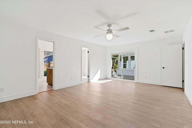 unfurnished room featuring ceiling fan and light wood-type flooring