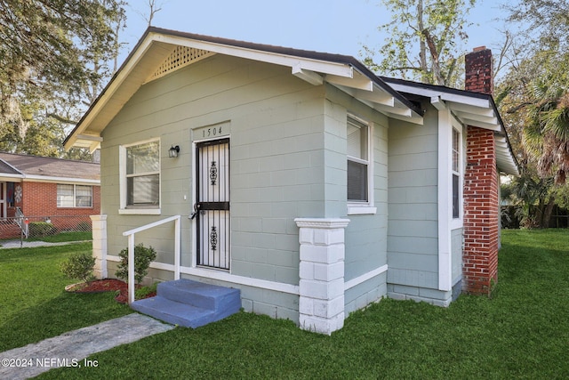 bungalow with a front yard