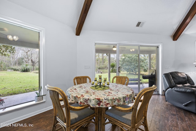 dining area featuring vaulted ceiling with beams and dark hardwood / wood-style floors