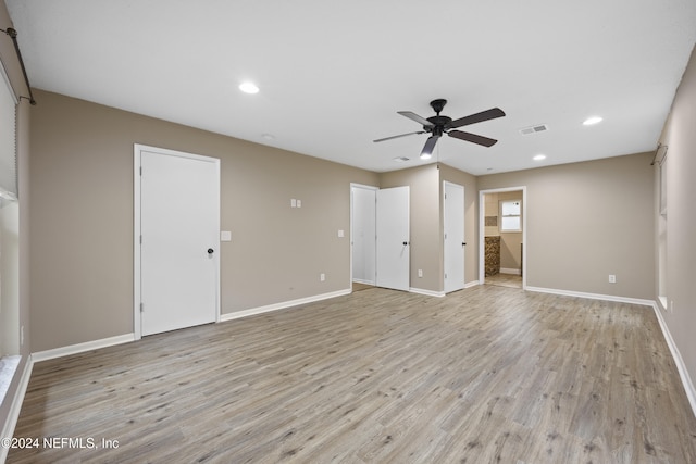 interior space with ceiling fan and light hardwood / wood-style flooring