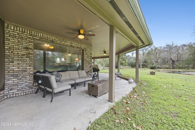 view of patio featuring an outdoor living space and ceiling fan