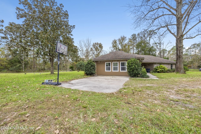 exterior space featuring a yard