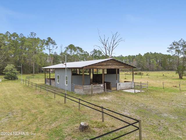 exterior space with a rural view