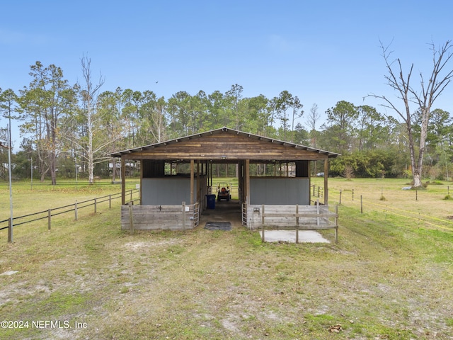 view of outdoor structure featuring a rural view