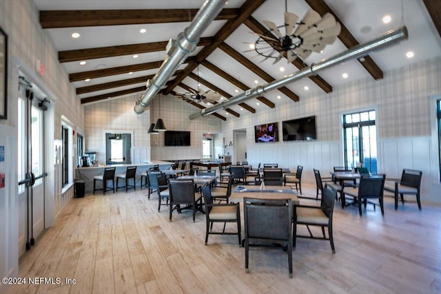 dining room featuring french doors, ceiling fan, high vaulted ceiling, light hardwood / wood-style flooring, and beamed ceiling